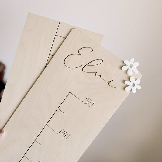 Wooden measuring stick daisies